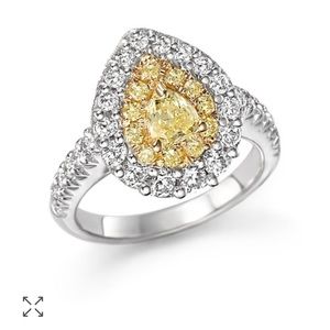 Yellow diamond engagement ring.